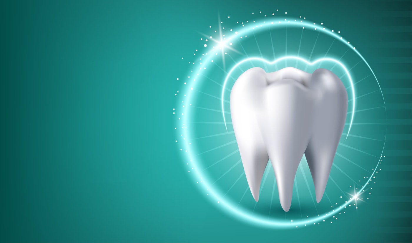 Illustrazione di un dente sano al centro di un alone luminoso